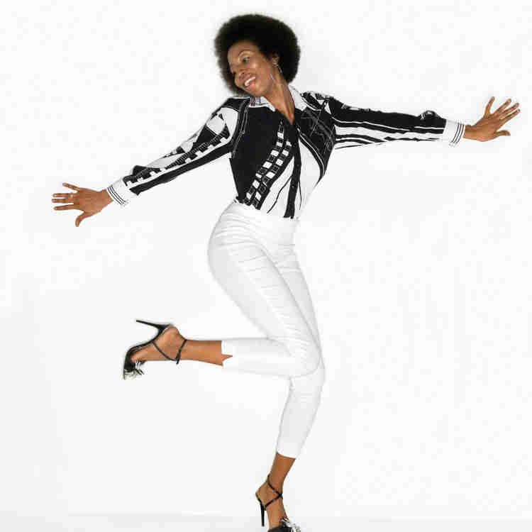 Dancer with stylish outfit and tall wheels for dancing. 